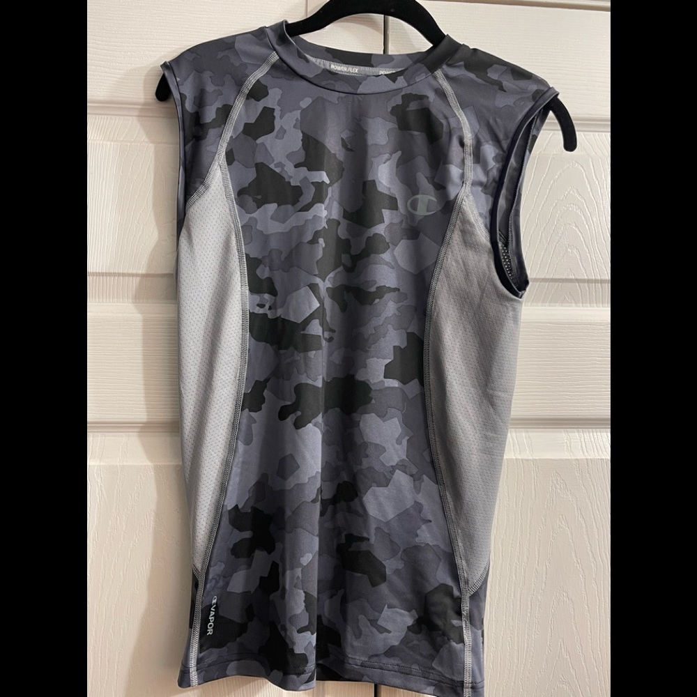 Grey/black/white sleeveless athletic top. Great condition 8/10.